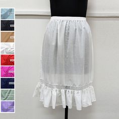 Discover the timeless allure of the cotton ruffle half slip with lace ( lace color remains white ). Crafted from high-quality cotton, it offers comfort and elegance. Perfect for a seamless silhouette, it adds a layer of modesty to skirts and dresses. Embrace classic style with this versatile wardrobe essential. Cotton Underskirt / Cotton Petticoat / Cotton Half Slip / Cotton Dress Liner ➡️Sale for 1 Half Slip with ruffle and white lace. ➡️100 % Light Weight Cotton.  ➡️Care: Hand wash in cold water. Do not bleach.  ➡️Available sizes : (Measurements are of garment only) X-SMALL- Fits US Size 0-2 (Elastic waistband 21.5" inch relax to 24.5" inch stretched, Hip 35" inch). SMALL- Fits US Size 2-4 (Elastic waistband 23" inch relax to 27" inch stretched, Hip 38" inch). MEDIUM- Fits US Size 6-8 (E Daywear Ruffled Tiered Skirt Petticoat, Daywear Tiered Skirt Petticoat With Ruffles, Daywear Tiered Petticoat With Ruffles, Daywear Ruffled Petticoat, White Cotton Petticoat With Attached Cancan, White Knee-length Skirt With Lace Trim, Summer Cotton Petticoat With Lace Trim, Fitted Ruffles Petticoat For Daywear, Cotton Lace-trimmed Petticoat For Daywear