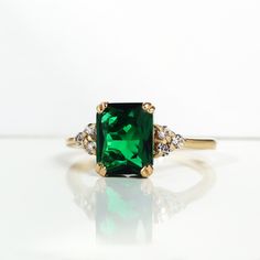 Emerald Ring May Birthstone Gold Ring Gemstone Band Statement Ring Engagement Ring Rectangle Ring Cocktail Ring Prong Ring - Etsy Formal Rectangular Emerald Ring With Center Stone, Elegant Emerald Gemstones With Accent Stones, Formal Rectangular Emerald Ring With Prong Setting, Rectangular Emerald Diamond Ring For Formal Occasions, Formal Diamond Ring With Prong Setting And Rectangle Stone, Luxury Rectangular Diamond Ring With Accent Stones, Formal Emerald Ring With Rectangular Stone, Square Cut Emerald Ring With Accent Stones For Wedding, Formal Rectangular Emerald Diamond Ring