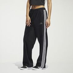 Comfort and style unite with these women's velour 3-stripe tracksuit pants. Designed with a wide leg at the bottom hem and snaps, wear the pant open or tapered based on your style. Featuring three-stripes at the side leg and an elevated gem branding at the wearers left leg, this pant mixes with your favorite pieces and features primegreen trims, echoing our commitment to sustainability.Front Style: Flat FrontClosure Type: DrawstringFit: Regular FitPockets: 2 Front Zip PocketsRise: Mid RiseSuppor Y2k Glam, Tracksuit Pants, Track Pant, Track Pants, Black Pants, Wide Leg, Stripes, Adidas, Pants