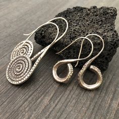 Unique fun and comfortable sterling silver earrings. Because of the designs and the big hook like ear wires this are perfect as ear weights also. They have all its unique design and shape, but they are all flat and light what makes them easy to wear. Perfect for your day by day outfits and also for a special ocassion. You can choose between 4 different styles. You can see in one of the pictures which number represents which pair. Style 1- This are 5.5cm- 2.25 inch long The spiral is 2.5cm- 1 inc Sterling Silver Drop Plug Earrings For Everyday, Silver Plug Earrings For Everyday Wear, Silver Sterling Teardrop Wrap Earrings, Silver Sterling Silver Teardrop Wrap Earrings, Artisan Sterling Silver Drop Earrings, Silver Teardrop Sterling Silver Wrap Earrings, Handmade Spiral Sterling Silver Wrap Earrings, Nickel-free Teardrop Sterling Silver Plug Earrings, Artisan Silver Drop Plug Earrings