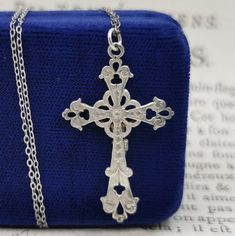 A beautiful antique religious necklace, with antique French silver cross crucifix, on a approx. 20 inch long sterling chain. Perfect for strength and protection necklace. Would make a nice gift for someone special! Material: sterling silver Cross measures: approx. 24 x 37 mm (0.9 x 1.6 inch) Total weight: 3.1g A stunning religious jewelry shop well worth a visit ... https://www.etsy.com/shop/SacredMagic Antique Silver Crucifix Jewelry As Gift, Antique Silver Crucifix Necklace For Gift, Vintage Sterling Silver Crucifix Jewelry, Vintage Nickel-free Crucifix Jewelry, Crucifix Necklace, Nickel-free Sterling Silver Crucifix Necklace, Protection Necklace, Sterling Silver Cross, Religious Jewelry