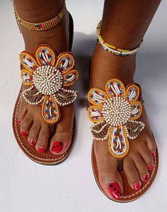 Beaded Sandals For Summer Vacation, Summer Vacation Beaded Sandals, Beaded Brown Sandals For Spring, Beaded Round Toe Sandals For Beach Season, Beaded Toe Loop Sandals For Vacation, Summer Beaded Sandals For Beach Season, Beaded Open Toe Sandals For Vacation, Handmade T-strap Sandals For Summer, Summer Beaded Open Toe Flip Flops