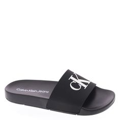 PRICES MAY VARY. A warm weather essential, the Calvin Klein Arin sandals are a must have for your wardrobe. This comfortable, slip-on look features a modern square toe and CK monogram detailing on the upper. Open Toe Slip on Closure Ck Monogram, Womens Slides Sandals, Modern Square, Womens Slides, Calvin Klein Woman, Kids Luggage, Slide Sandals, Warm Weather, Special Features