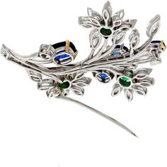 Let the essence of luxury envelop you with the enchanting Van Cleef & Arpels Platinum Bouquet Brooch, a masterpiece of elegance and craftsmanship. This exquisite brooch, signed and numbered by Van Cleef & Arpels, is a testament to the artistry of fine jewelry. Delicately designed with a floral motif, it is adorned with a mesmerizing array of diamonds, sapphires, and emeralds, each stone carefully selected for its exceptional quality and brilliance.What makes this brooch truly exceptional are the four sapphires, each accompanied by GIA reports confirming their natural beauty and rarity. One of these sapphires hails from Burma, adding a touch of exotic allure to this already stunning piece. The commitment to sourcing the finest gemstones and the meticulous attention to detail are evident in Elegant Multi-stone Brooches For Formal Occasions, Fine Jewelry Multi-stone Wedding Brooches, Elegant Multi-stone Brooches For Gifts, Emerald Brooch, Bouquet Brooch, Emerald Birthstone, Van Cleef And Arpels, Brooch Bouquets, Platinum Metal