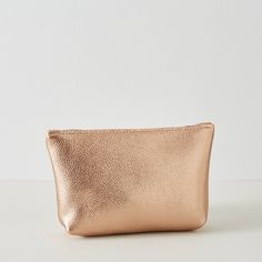 Introducing our stylish Rose Gold Leather Cosmetic Pouch, the perfect travel bag and make-up bag for any woman on the go. This luxurious pouch is made from high-quality, soft leather and features a secure zipper closure to keep all of your essential items safe and organised. Not only is this cosmetic pouch practical, but it also makes for an ideal gift for her, particularly as a bridesmaid gift idea. The soft rose gold leather adds a touch of sophistication to any outfit, making it a versatile a Elegant Pouch With Interior Card Slots For On-the-go, Elegant Cosmetic Bag With Zipper For On-the-go, Chic Cosmetic Bag With Removable Pouch For On-the-go, Chic Travel Cosmetic Bag With Removable Pouch, Chic On-the-go Cosmetic Bag With Removable Pouch, Gold Rectangular Bag With Interior Card Slots, Rectangular Gold Bag With Interior Card Slots, Chic Travel Pouch With Zipper Closure, Chic Travel Clutch With Rectangular Case