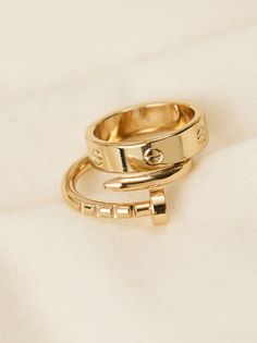 This is such a cute and unique ring set featuring a wrapped nail and simple gold band ring! These simple yet stand out rings are perfect to layer with for a trendy stacked look! Ora Ring, Good Rings, Gold Rings Women, Gold Rings Set, Simple Gold Band, Aesthetic Rings, Ring Inspo, Wedding Branding, Nail Ring