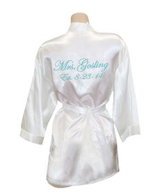 a white robe with the words mr and mrs written on it