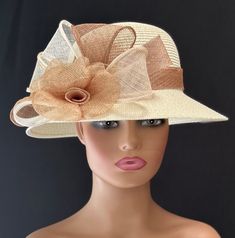 This hat is a very elegant and sophisticated ivory colored straw hat. A beautiful design featuring Sinamay flowers and leaves in light tan,ivory, beige and white  This creation is a perfect hat for church or for the Kentucky Derby. Stunning for a wedding party or tea party. Amazing hat for special occasions. You will love it! Brim: 3" Rise: 4" Size: Internal Draw String to adjust to any size head Hat Tea Party, Easter Hat, Ladies Hats, Sinamay Hats, Easter Hats, Hat Wedding, Church Hat, Tea Party Hats, Kentucky Derby Hat