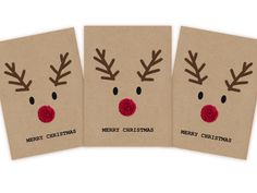 three christmas cards with reindeer's noses and nose made out of brown paper on white background