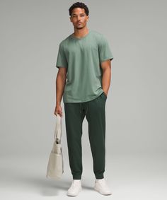 Rest And Reset. These Lightweight Joggers Have A Softly Brushed Interior That Makes Downtime Irresistible. Designed For Casual. Slim Fit Skims Glutes And Thighs, Then Tapers To Hem:intended To Sit At Ankle For 32"-34" Inseam. Hand Pockets With Hidden Phone And Coin Sleeves. Zippered Back Pocket. Waistband Drawcord Can Be Worn Inside Or Out. | Soft Jersey Jogger Regular Men’s Athletic Wear Winter, Men’s Joggers, Mens Joggers Outfit, Lightweight Joggers, Joggers Lululemon, Jogger Outfit, Joggers Men, Fitness Outfits, Green Joggers