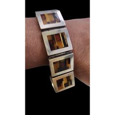 Absolutely Spectacular Sterling and Mosaic Amber Rare Bracelet- Possibly by Jerzy Zaulichny (A5547) Size: 7.75", by1" wide, Condition: Very good vintage Signed: None Details: Unsigned, but after doing a lot of research, it's possibly by Polish designer Jerzy Zaulichy. I have seen these sell from $500 to $1100! None that I found were signed with any makers mark; some were almost exact, a few were in the same style. This is an exceptional piece. I also have the ring; I will be listing it as well. all hinged push in clasp. Not marked, tests as sterling. Some light scratches to the silver! Please look at all the photos, as they are part of the description. I try my best to point out any flaws. Also please remember this is a preloved piece and may show signs of light wear, marks, scratches, etc Same Style, Vintage Bracelets, Vintage Costume Jewelry, Remember This, Vintage Costumes, Women Accessories Jewelry, Chain Link Bracelet, Makers Mark, Vintage Signs