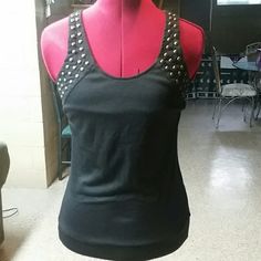 This Beautiful Black Studded Shirt Is Great Paired With Any Bottom. It's Full Of Detail. You Can Lace It Up In The Back Make It Loose Or Tight. Bronze/Gold Studs Makes It Very Edgy! Edgy Cotton Top For Night Out, Punk Stretch Tops For Night Out, Punk Style Stretch Tops For Night Out, Edgy Cotton Tank Top For Night Out, Edgy Cotton Party Top, Punk Style Cotton Party Tops, Black Fitted Rebellious Tops, Black And Gold Shirt, Studded Shirt