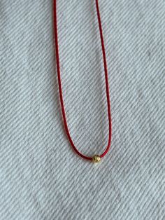 Handmade item You can use it short or long. 925 k sterling silver gold plated bead Dainty Jewelry With Sliding Knot And Round Beads, Red Dainty Round Beaded Jewelry, Dainty Red Round Beaded Jewelry, Dainty Red Round Bead Jewelry, Gold Necklaces With Round Beads For Blessing, Red Dainty Jewelry With Round Beads, Handmade Red Necklace For Everyday, Red Spiritual Jewelry For Everyday, Red Dainty Adjustable Necklace