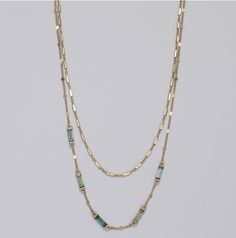 Shades of blue and green crystals with stationed gold chains. Blue Multi-strand Metal Jewelry, Blue Necklace With Delicate Metal Chain, Blue Metal Chain Necklace With Clavicle Chain, Blue Metal Clavicle Chain Necklace, Shades Of Blue And Green, Blue Crystal Necklace, Wedge Flip Flops, Gold And Blue, Custom Name Necklace