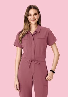 Stretch Solid Jumpsuits And Rompers With Elastic Waistband, Utility Style Jumpsuits And Rompers With Relaxed Fit, Utility Relaxed Fit Jumpsuit In Solid Color, Solid Short Sleeve Jumpsuits And Rompers With Side Pockets, Short Sleeve Jumpsuits And Rompers With Side Pockets, Solid Color Short Sleeve Jumpsuit With Side Pockets, Short Sleeve Stretch Jumpsuits And Rompers With Pockets, Versatile Solid Jumpsuits And Rompers With Pockets, Versatile Jumpsuits And Rompers With Pockets