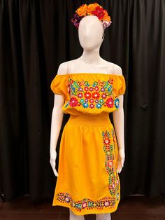 Beautiful dress with embroidered colorful flowers top to bottom. It is lightweight for every day wear. It has elastic on the waist and shoulders for a flirty look. Dress lenght is above knee. Every flower is stich by hand in Antigua Guatemala.   Headband not included. Embroidered Floral Dress, Dress With Elastic Waist, Floral Embroidered Dress, Flower Tops, Above Knee, Beautiful Dress, New Style, Guatemala, Colorful Flowers