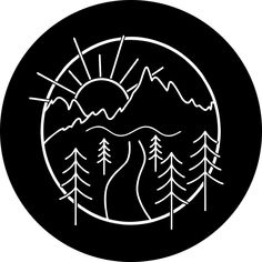 a black and white circle with trees in the middle, sun rising over mountains behind it