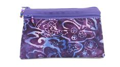 Unique ID/cosmetic bag. Three full zipper pockets with embellished zipper pulls.  Great for storing eyeglasses, makeup, hair accessories, or credit cards. Perfect for Bridesmaids! Hand sewn from high quality batik and canvas. Purple batik, and clear vinyl pockets on the outside. Lining is also batik fabric. Purple zippers used for all three pockets and accented with a hand beaded zipper pulls.  Hand wash. Dimensions: Height: 5 inches Width: 7.5 inches This bag is made and ready to ship. FREE SHIPPING with  in the United States! Bag will ship via USPS First Class mail with delivery confirmation. What others are saying about these bags: "Amazing Craftsmanship!" "Fast shipping and thoughtfully packaged!" "Absolutely beautiful!" "Love this bag!" Eyeglasses Makeup, Lavender Cosmetic, Beaded Zipper Pulls, Pouch Makeup, Bleu Violet, Blue Lavender, Toiletry Storage, Batik Fabric, Clear Vinyl