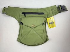 Waist bag/Shoulder bag/Pallet bag. Unisex and adjustable belt. 5 pockets in total: -3 front pockets closed with zippers. -1 back pocket closed with zipper. -1 small "secret" pocket on the side of the fanny pack, closed with velcro. Size approx. waist bag: 22cm wide * 27cm high. Size approx. Top bag: 15cm * 23cm high. Size approx. Front bag: 16cm wide * 18cm high. Size approx. inner bag: 11cm wide * 15cm high. Size approx. back bag: 18cm wide * 24cm high. Minimum belt length (including shoulder s Khaki Belt Bag With Pockets For Daily Use, Daily Use Khaki Belt Bag With Pockets, Casual Khaki Belt Bag With Pockets, Multifunctional Rectangular Belt Bag With Pockets, Practical Green Shoulder Bag With Pockets, Green Belt Bag With Cell Phone Pocket For Outdoor, Rectangular Outdoor Belt Bag With Pockets, Practical Crossbody Chest Bag With Pockets, Green Belt Bag With Zipper Pocket For Outdoor