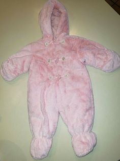 This is one BEAUTIFUL SNOWSUIT in a size 6/9 months, made by ROTHSCHILD. the mittens can be folded back if wanted. She will be toasty warm in this one mom. Very gently worn, no damages!! the length from the top of the shoulders to the bottom of the booties measures 26 inches. no damages. SUPER soft!! All of our items are from a smoke free home. we do our best to describe them as we see them. if for any reason you are not pleased with an item, please let us know. we do NOT refund s/h fees for any Cute Pink Winter Onesie, Cute Pink Hooded Onesie, Pink Snow, Retro Baby, Baby Fits, 9th Month, Button Flowers, Baby Outfits, Snow Suit