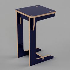 a small blue table with an open shelf on the bottom and one leg in the shape of a rectangle