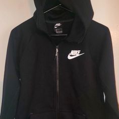 Nike Boys Full-Zip Hooded Jacket Cotton/Polyester Blend Black (Large) New Without Tags 14/16 Nike Black Fleece Hooded Jacket, Black Nike Hooded Hoodie, Nike Black Hooded Hoodie, Black Nike Hoodie With Adjustable Hood, Nike Black Outerwear With Adjustable Hood, Nike Black Casual Hooded Jacket, Casual Black Nike Hooded Jacket, Nike Black Hooded Jacket With Drawstring, Nike Black Windbreaker With Drawstring Hood