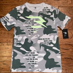 Brand New With Tags. Nike Green Graphic Print T-shirt, Nike Green T-shirt With Graphic Print, Nike Green Tops With Graphic Print, Nike Green Tops With Logo Print, Nike Green Top With Logo Print, Russell Wilson, Kids Nike, Nike Shirts, Gray Green