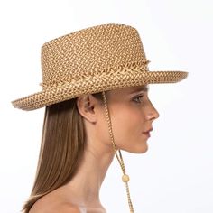 Tucson is a designer woman's sunhat for sale made of Squishee®. The modified Western shape has a fringe edged band and a self bolo braid chin strap with a wood bead to adjust and secure it. The signature logo rivet is discretely placed at the back of the crown. The wired brim permits shaping; push up the sides for more Western flare, or flatten them out for additional shade. Squishee® is a man-made material incorporating recycled fibers. It looks and feels just like natural raffia but has the ad Adjustable Fringe Hats, Adjustable Brimmed Fedora With Upf 50+, Adjustable Straw Boater Hat For Travel, Spring Flat Brim Hat With Fringe, Adjustable Natural Boater Hat For Travel, Country Style Adjustable Sun Hat For Travel, Brown Adjustable Sun Hat With Upf 50+, Adjustable Fringe Sun Hat With Curved Brim, Adjustable Fedora With Upf 50+ And Short Brim