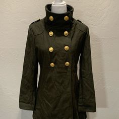 New With Out Tags Women Olive Double Breasted Funnel Neck Coat Size Medium Style: 12229 Color: Olive Material: Shell: 55% Wool 45% Polyester Lining: 100% Polyester Fitted Pea Coat With Stand Collar For Fall, Military Style Winter Workwear Outerwear, Military Style Outerwear With Stand Collar And Buttons, Military Style Pea Coat For Winter Workwear, Military Outerwear With Stand Collar And Buttons, Winter Military Style Workwear Outerwear, Military Outerwear With Stand Collar, Olive Button-up Winter Outerwear, Olive Winter Outerwear With Buttons