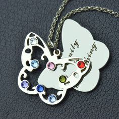 Celebrate your love for mom with this gorgeous sterling silver family butterfly birthstone necklace. The shape of butterfly is the symbol of change, this makes an especially memorable gift for a new mom or grandma. Mother's Day Butterfly Charm Pendant Necklace, Mother's Day Butterfly Jewelry With Butterfly Charm, Mother's Day Jewelry With Butterfly Charm, Mother's Day Butterfly Charm Jewelry, Mother's Day Butterfly Pendant Necklace, Mother's Day Anniversary Necklace With Butterfly Charm, Butterfly Charm Necklace For Mother's Day Anniversary, Butterfly Charm Necklace For Anniversary And Mother's Day, Anniversary Butterfly Charm Necklace For Mother's Day