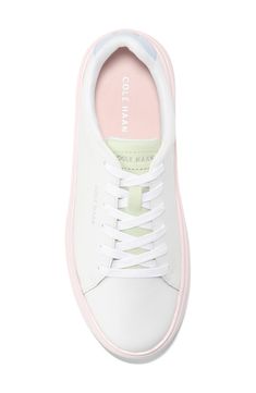 This sleek leather sneaker with clean lines inspired by classic tennis styles has rubber caps at the toe and heel for added traction. Round toe Lace-up style Removable cushioned footbed Leather upper/textile lining/synthetic and rubber sole Imported Classic Synthetic Sneakers For Spring, Spring Lace-up Sneakers With Rubber Toe Cap, Classic Spring Synthetic Sneakers, Modern Spring Sneakers With Gum Sole, Spring Sneakers With Rubber Toe Cap, Sporty Low-top Platform Sneakers With Rubber Toe Cap, White Lace-up Platform Sneakers With Rubber Heel Cap, Modern Sneakers With Contrast Sole For Spring, Classic Sneakers With Gum Sole For Spring