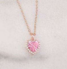 "This heart initial necklace is made with your choice of a 10mm Pink, Aqua Blue or Olive Green and clear cubic zirconia heart which hangs on an 18-inch rose gold-plated cable chain. Just pick your heart crystal color in the drop down menu. Thank you for looking. NOTE: This listing is for one necklace with one pendant, but you can choose to purchase just the pendant without the chain (see drop down menu). The \"Pendant Only\" option includes the pendant with a bail/top loop and no chain. The beau Mother's Day Rose Gold Heart Necklace With Cubic Zirconia, Pink Initial Pendant Jewelry For Mother's Day, Pink Round Necklace For Valentine's Day, Pink Heart Cut Birthstone Necklace, Personalized Rose Gold Heart-cut Necklace, Valentine's Day Rose Gold Heart Clavicle Necklace, Personalized Rose Gold Heart Cut Necklace, Valentine's Day Rose Gold Pendant Charm Necklace, Rose Gold Heart Beads Pendant Necklace