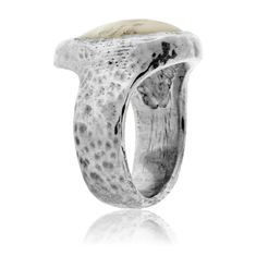 Sterling Silver Hammered Simple Elk Ivory Ring Immerse yourself in the rugged charm of our Sterling Silver Hammered Simple Elk Ivory Ring, a symbol of the raw beauty of nature and your hunting triumphs. This distinctive piece tells a story of adrenaline-filled adventures, of solitary moments in the wilderness, and of personal achievement. Each elk ivory is meticulously fitted into its unique setting by our master goldsmiths, mirroring the extraordinary precision and patience required in your hun Elk Ivory Ring, Elk Ivory, Tooth Ring, Ivory Ring, Aquamarine Studs, Interlocking Ring, Antler Ring, Elk Antlers, Braided Ring