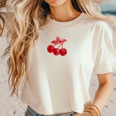 The Cutest Cherry Boxy Tee.  💠 This boxy tee is the perfect gift for a girly girlfriend in your life or a great addition to your wardrobe.  This women's oversized boxy t-shirt offers exceptional comfort and a relaxed style suitable for any occasion. Made from 100% ring-spun cotton, it feels incredibly soft. The boxy fit, with its slightly cropped, seamless design, provides that distinctive oversized look.  💠 Features 💠 :: Exceptionally Soft Ring-Spun Cotton :: Our tee style is UNISEX and runs Trendy Summer Tops With Cherry Print, White Short Sleeve Top With Cherry Print, White Cherry Print Short Sleeve Top, Spring Cotton Top With Cherry Print, Trendy Cherry Print Tops For Summer, Spring White T-shirt With Cherry Print, Spring White Cherry Print T-shirt, Casual Summer Shirt For Gift, Casual White Cherry Print Tops