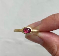 Our ancient inspired Parthian stacking ring is set with an oval cabochon (smooth rather than faceted) pink tourmaline stone. Stone measures 6mm x 4mm. Approx band width 2.6mm - 1.7mm at back of band. Approx weight: 2.3g in Silver, 2.5g in 9ct. Pictured here with matte finish. For a high shine finish please leave a note at checkout. Pretty Wedding Rings, Metalsmithing Jewelry, Ring Stack, Dope Jewelry, Jewellery Ideas, Tourmaline Stone, Cabochon Ring, Stacking Ring, Oval Cabochon