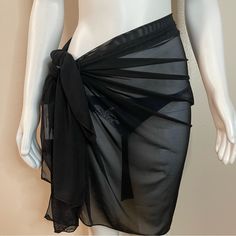 Black Sheer Beachwear Mesh Sarong Swimsuit Cover Up Color: Black Material: Self, Lining, Mesh: 95% Polyester, 5% Elastane Please Notice: Bikini Top And Bottoms Are Just For Display, Listing Is For The Cover Up Only. All Measurements Are Approximate And Taken Laying Flat: S/M Length: 60 Inches Height: 29 1/2 Inches L/ Xl Length: 63 Inches Height: 30 Inches Tags For Exposure: Black Mesh Mesh Location: Tote: #10 Black Bathing Suit Cover Up, Summer Bikinis Coverups, Swim Skirt Cover Up, Sheer Beachwear For Party, Black Beachwear Cover-up For Spring, Black Sheer Cover-up For Beach Season, Party Sheer Beachwear, Party Beachwear With Sheer Details, Casual Black Poolside Cover-up