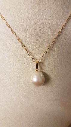 Baroque pearl pendant 20mm x 15mm (approx) with gold-filled bail. Due to uniqueness of beads shapes may differ slightly. 18 inch chain is included. Very beautiful and unique. Gold Pearl Necklace With Oval Pendant And Pearl Drop, Gold Oval Pendant Pearl Necklace For Gift, Gold Pearl Necklace With Large Pendant, Handmade Pear-shaped Gold Necklace, Gold Teardrop Pendant Pearl Necklace For Gift, Gold Gold, Baroque Pearls, Pearl Pendant, Gold Filled