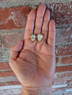 "Sparkly crystal teardrop stud earrings from Napier. Dress up or down from weddings to wine night. Measurements .75\" x .50\" Marked Napier and copyright symbol, please see photo. These pierced earrings feature a faceted glass rhinestone in a high polish gold tone bezel. No chips or cracks in the stone. New push backs included. In excellent vintage condition. Please message me with any questions." Pear-shaped Crystal Earrings For Anniversary, Gift Pear-shaped Crystal Earrings, Nickel-free Teardrop Crystal Earrings For Anniversary, Nickel Free Teardrop Crystal Earrings For Anniversary, Copyright Symbol, Adored Vintage, Wine Night, Floral Pins, Crystal Stud Earrings