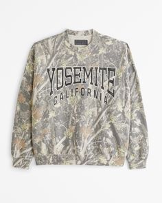 Classic sweatshirt in our softAF fleece fabric and oversized-fit silhouette, featuring Yosemite-inspired graphic detail at chest, crew neckline and banded hem and cuffs. Yosemite California, California Sweatshirt, Camo Sweatshirt, Camo Hoodie, Men's Tops, Embroidered Hoodie, Green Camo, Crew Sweatshirts, Hoodie Top