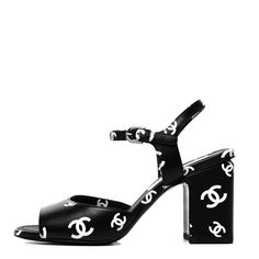 Chanel Lambskin Printed CC Sandals Heels Shoes 22S Black/White Size 40 NEW. This is an authentic pair of CHANEL Lambskin Printed CC Sandals size 40 in Black and White. These stylish sandals are crafted of black calfskin leather. The sandals feature a Chanel CC logo design in white, and a 3.5-inch block heel. Comes with 2 chanel bags only, no box. Sorry, no returns. All sales final. Please know your size. Black And White Chanel Bag, High-end Open Toe Summer Sandals, High-end Open Toe Sandals For Summer, Designer Open Toe Heels With Contrasting Heel Counter, Designer Block Heels With Contrasting Heel Counter, High-end Open Toe Heels With Branded Heel Counter, Designer Sandals With Branded Heel Counter And Block Heel, Cc Logo Design, White Chanel Bag