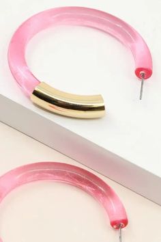 Get down tonight with these funky, brightly colored poly hoops, available in both purple and pink.Lucite hoop earrings with metal tube accent Material: Lucite, Zinc Lead Compliant, Nickle Free Fitbit Flex, Bright Colors, Hoop Earrings, Purple, Pink