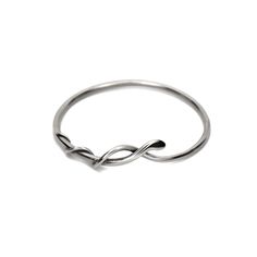 Gorgeous wrapped snake bangle with a smooth polished finish. These look amazing stacked together! Available in sterling silver or brass. - Bangle measures 2 1/2" across Sterling Silver Hoop Jewelry With A Modern Twist, Modern Twist Sterling Silver Hoop Jewelry, Silver Stainless Steel Bangle With Polished Finish, Hand Forged Elegant Bangle, Adjustable Stainless Steel Bangle With Polished Finish, Stainless Steel Bangle With Polished Finish, Modern Twist Silver Hoop Jewelry, Modern Hand Forged Bangle Bracelet, Adjustable Cuff Bracelet With Polished Finish