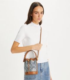 T Monogram Denim Mini Bucket Bag: Women's Designer Crossbody Bags | Tory Burch Denim Bucket Bag, T Monogram, Mini Bucket Bag, Mini Bucket Bags, Mini Bucket, Womens Designer Handbags, Designer Crossbody, Designer Crossbody Bags, Denim Mini