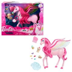 the pink pony has wings and is next to it's packaging box with its contents