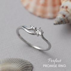 Delicate Silver Diamond Ring For Proposal, Dainty Sterling Silver Promise Ring, Dainty Sterling Silver Rings For Promise, Silver Dainty Diamond Ring For Proposal, Dainty Sterling Silver Diamond Ring For Proposal, Sterling Silver Promise Ring With Round Stone, Sterling Silver Promise Diamond Ring With Round Stone, Sterling Silver Diamond Ring With Tension Setting For Promise, Silver Dainty Proposal Ring