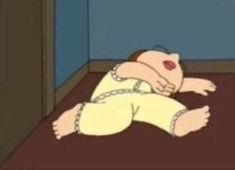 a cartoon character is laying on the floor with his head down and eyes wide open