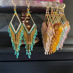 Long Turquoise dangle beads earrings purple mint and lavender. Handmade Glamorous Jewelry Gift, Costume Jewelry With Faceted Dangle Beads, Elegant Multicolor Beaded Dangle Earrings, Elegant Multicolor Jewelry With Dangling Beads, Turquoise Beaded Dangle Jewelry, Turquoise Dangling Beads Costume Jewelry, Gold Bohemian Beaded Earrings With Faceted Beads, Bohemian Gold Earrings With Faceted Beads, Green Long Drop Jewelry With Dangling Beads