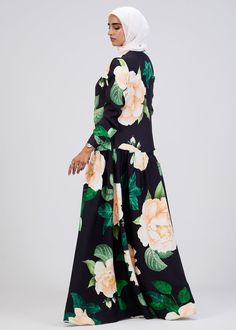 Elevate your wardrobe with this stunning floral print button-front maxi dress, crafted from durable crepe fabric for long-lasting comfort and elegance. The soft black base is adorned with a vibrant floral pattern, making it a standout piece for any occasion. Designed with a modest fit, this dress features a belted waist and tiered skirt, providing a flattering silhouette that flows gracefully with every movement. The button-front design adds a touch of sophistication, while the long sleeves ensu Button Front Maxi Dress, Modest Fits, Abaya Dress, Button Front Dress, Floral Print Maxi Dress, Floral Print Maxi, Dress Satin, Button Dress, Crepe Fabric