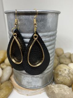 "Beautiful handmade item, real genuine leather earrings, includes a coordinating shape charm in a variety of metals and color options, bronze, silver and gold. Earring colors are black, rich cognac brown weathered leather and camel/mustard. Mustard is silver charm and hook Cognac brown is bronze charm and hook Black is gold charm and hook All available in round or teardrop. Round measures Aprox 1.5\" and teardrop Aprox 2\"" Everyday Leather Teardrop Earrings, Leather Teardrop Jewelry, Leather Teardrop Earrings For Everyday Use, Elegant Teardrop Leather Jewelry, Elegant Black Leather Earrings, Black Leather Earrings As A Gift, Leather Dangle Jewelry For Everyday, Everyday Leather Dangle Jewelry, Elegant Nickel-free Earrings For Everyday Use