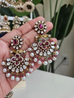 Fine Victorian Kundan Jhumka with CZ stones and uncut Polki Kundan stones Surely a statement Jhumka earringThe earring has very fine quality and craftmanship and also has a very elegant look pictures cannot do justice to how beautiful this jhumka earrings is . Temple Jewelry Stone Work Danglers For Celebration, Temple Jewelry Danglers With Stone Work For Celebration, Temple Jewelry Style Bridal Earrings With Stone Work, Temple Style Bridal Earrings With Stone Work, Temple Style Chandbalis With Stone Work For Reception, Temple Jewelry Stone Work Drop Earrings, Diwali Temple Jewelry Pearl Earrings With Stone Work, Temple Jewelry Bridal Earrings With Stone Work, Diwali Reception Chandelier Earrings With Stone Work